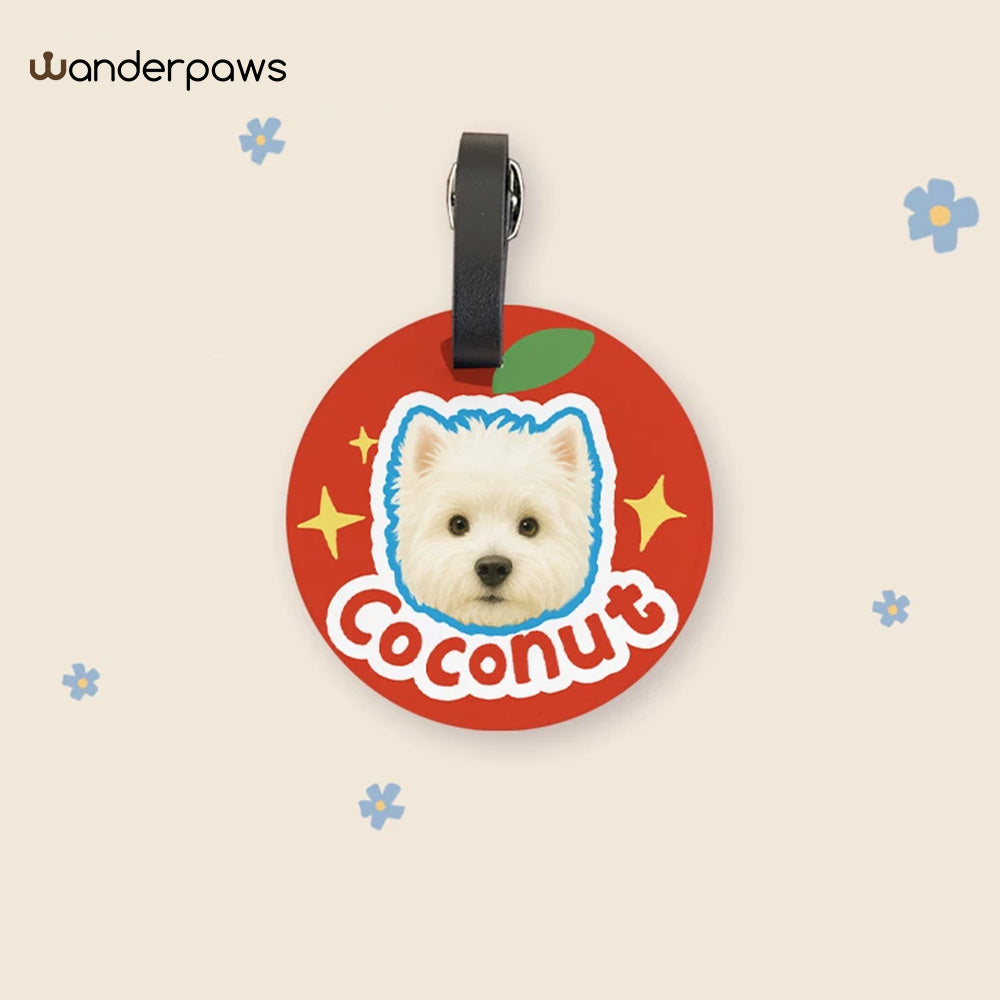 Red round personalized pet photo luggage tag with an apple design featuring a small white dog named Coconut
