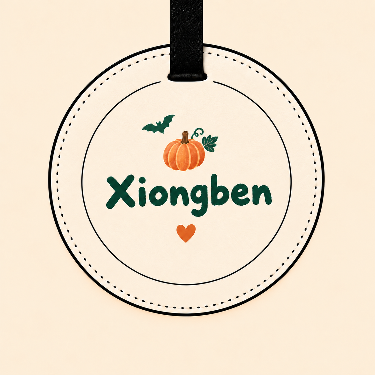 Back of the Halloween pumpkin pet luggage tag with Xiongben’s name and a small pumpkin