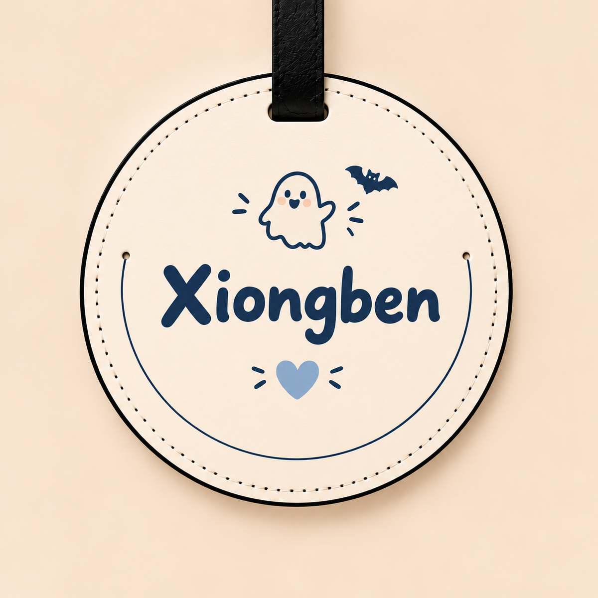 Back of the Halloween ghost pet luggage tag with Xiongben’s name and a small ghost