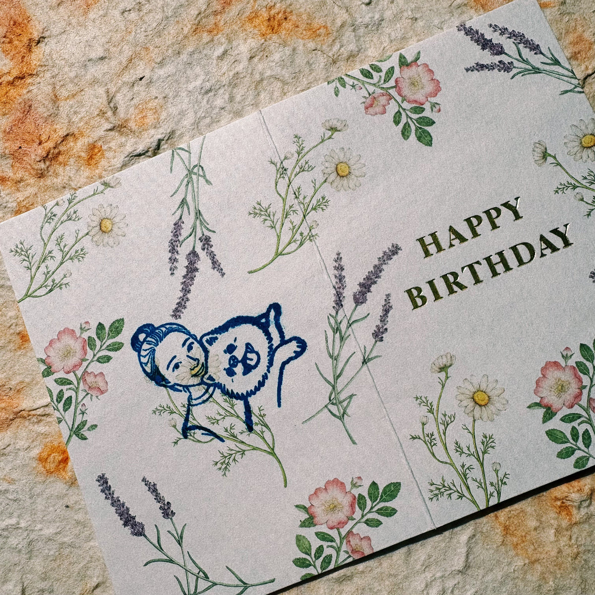 Blue personalized pet portrait stamp impression on a floral birthday card
