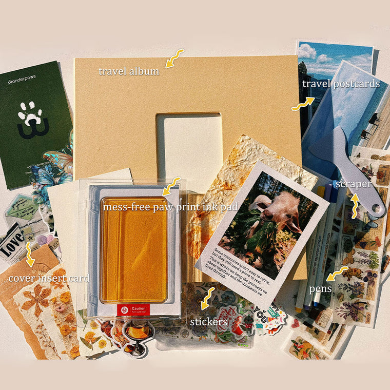 DIY pet travel memory album kit with paw print ink pad, postcards, stickers, pens, scraper, and cover insert card